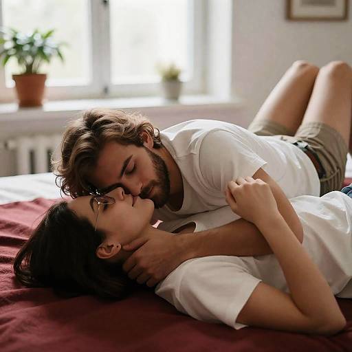 Intimate Embrace on a Sunlit Bed