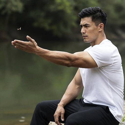 Dynamic Photo of a Muscular Man by Lake