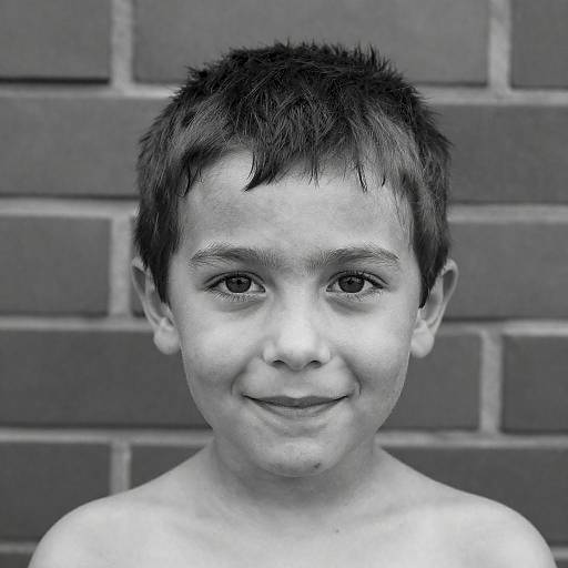 Expressive Boy Against Brick Wall