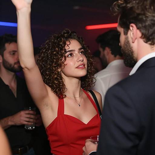 Woman in Red Dress at Nightclub