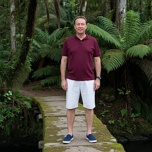 Man on Mossy Forest Stone Bridge