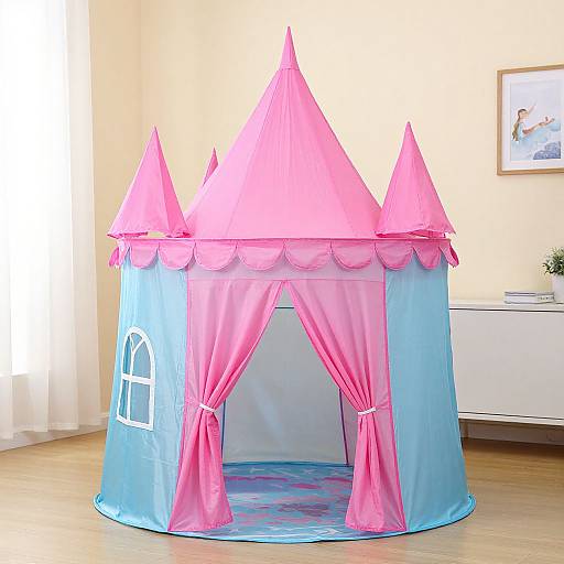 Photograph of a bright blue and pink castle playhouse with pink conical roofs, pink curtain entrance, and a light wooden floor.