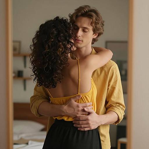 Intimate couple hug reflected in mirror