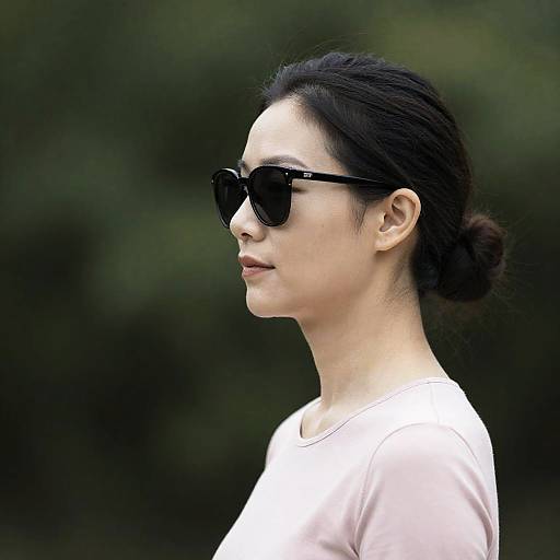 Serene Profile of Asian Woman in Nature