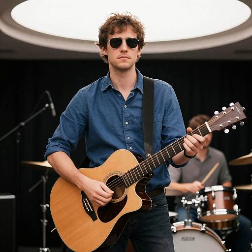 Dynamic Duo of Musicians on Stage