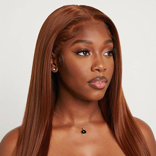 Black Woman with Auburn Hair and Nose Piercings