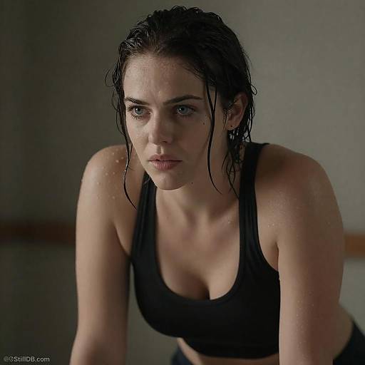 Intense Portrait of a Wet Dark-Haired Woman