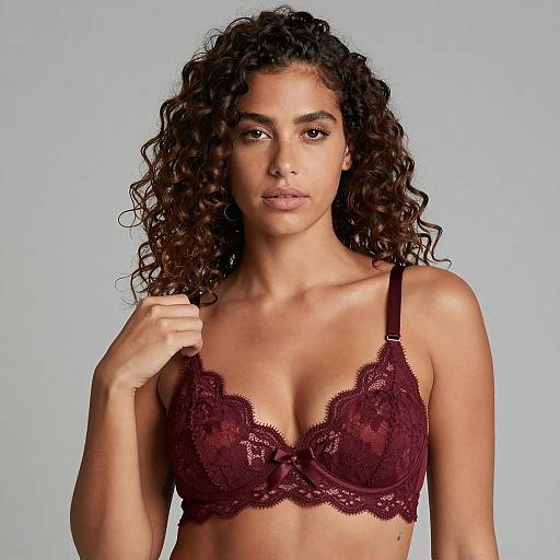 Curly Haired Woman in Maroon Lace Bra