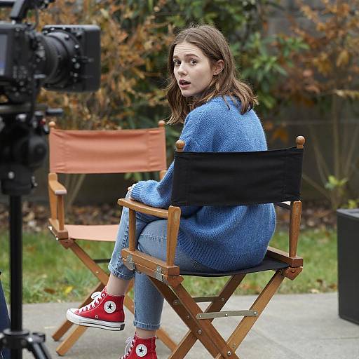 Young Woman in Blue Sweater Outdoors