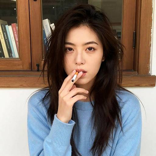 Intense Woman with Cigarette in Cozy Room