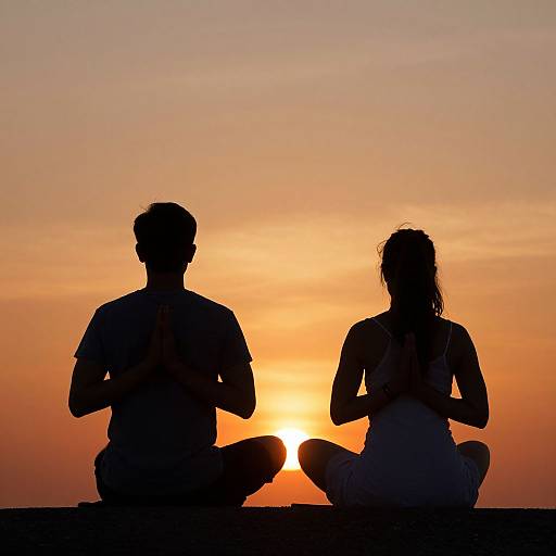 Meditating Silhouettes at Sunset
