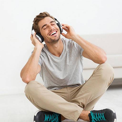Joyful Young Man Enjoying Music