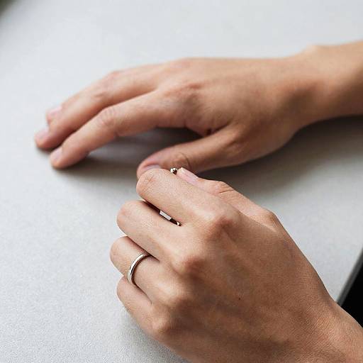 Close-Up Hands with Ring and Object