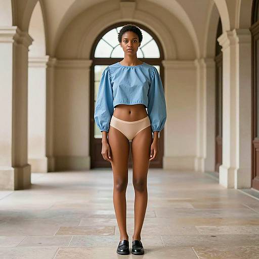 Young Woman in Blue Puff-Sleeve Blouse and Beige Underwear