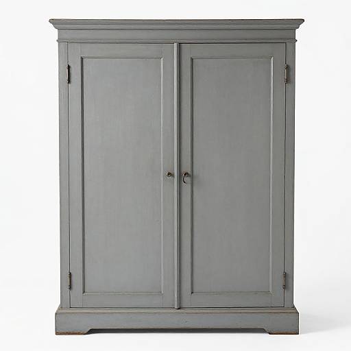 Photograph of a gray, wooden, double-door cabinet with black knobs, simple panel design, and black metal hinges, set against a plain white background