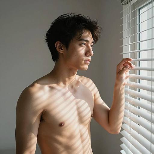 Sunlit Man by Window with Shadows