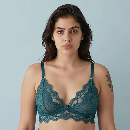 Young Woman in Teal Lace Bra with Rose Tattoo