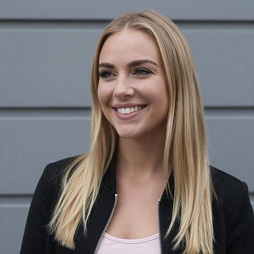 Smiling Woman in Black and Pink Outfit