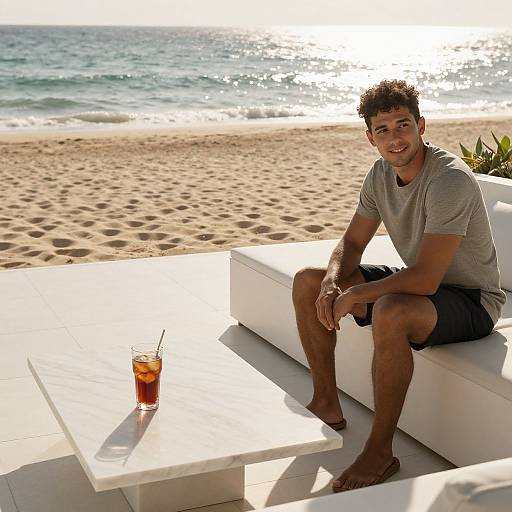 Modern Seaside Patio with Thoughtful Young Man