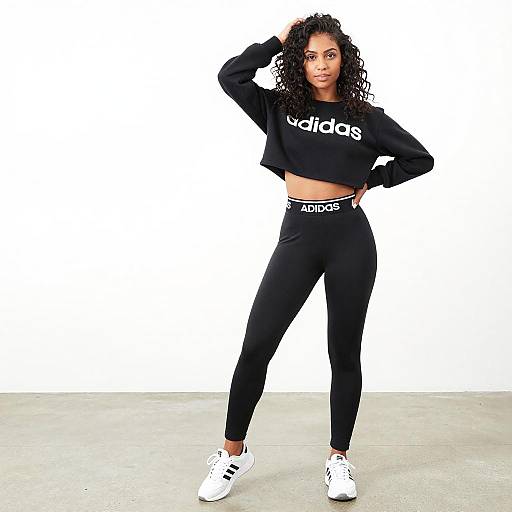 Confident Young Woman in Adidas Outfit