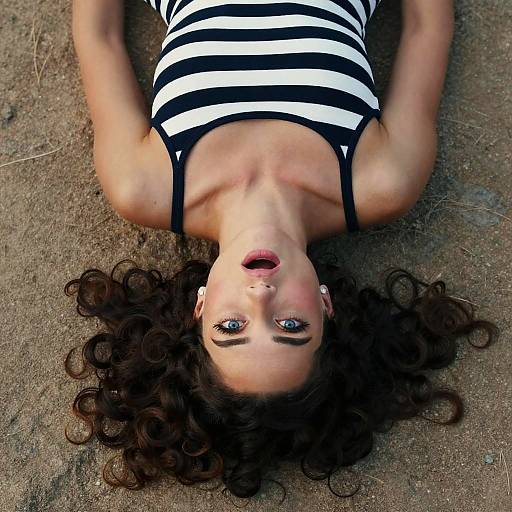 Aerial View of Woman Lying on Ground