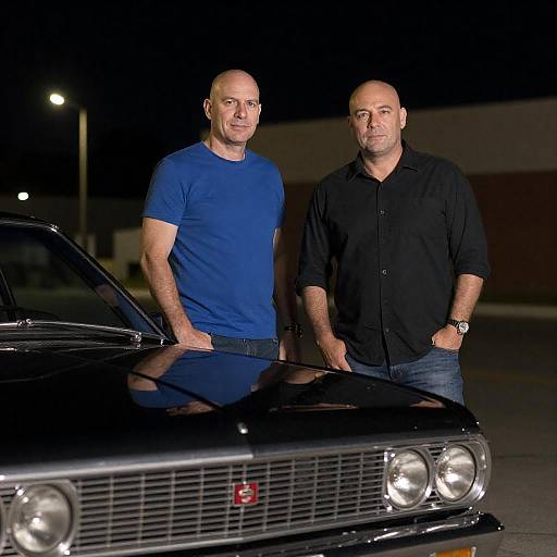 Two Men Beside Vintage Car at Night