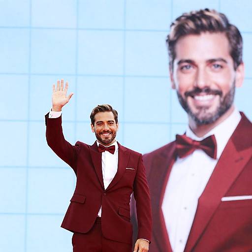 Cheerful Man in Red Suit with Portrait