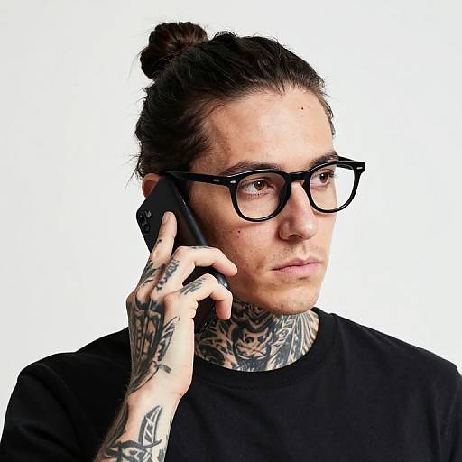 Contemplative Tattooed Person Portrait