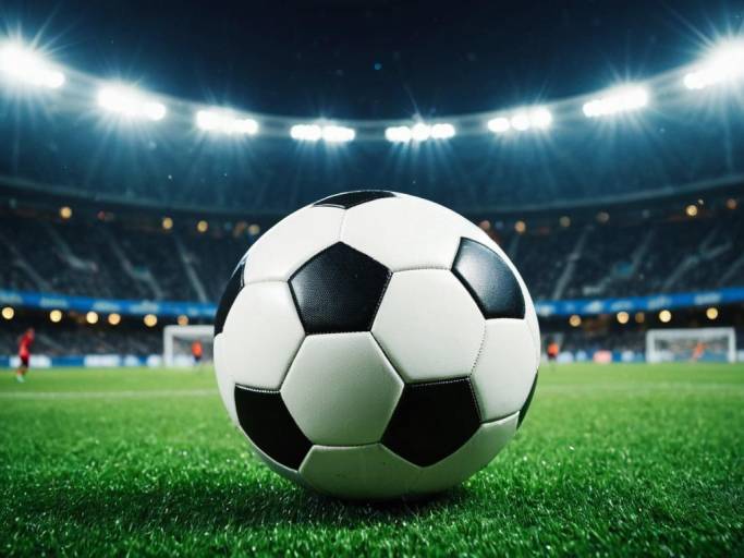 Soccer Ball on Stadium Field