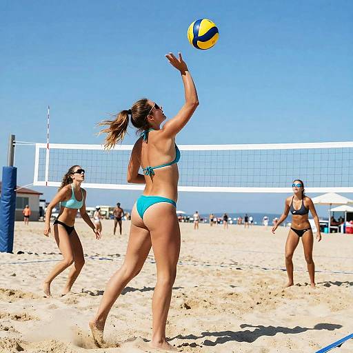 Energetic Girls Playing Beach Volleyball