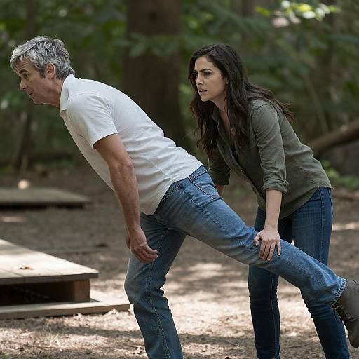 Woman Pulling Man in Sunlit Woods