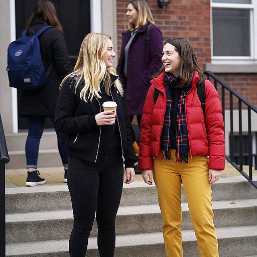 Joyful Women Posed on Autumn Steps