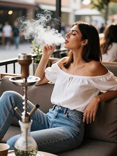 Woman Smoking Shisha at Outdoor Cafe