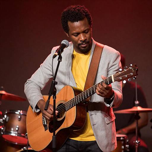 Acoustic Musician in Warm Red Lighting