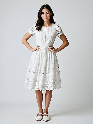 Woman in White Eyelet Lace Dress