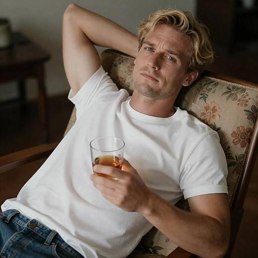 Relaxed Man in Dimly Lit Room