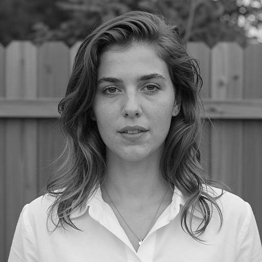 Black and white portrait of young woman outdoors