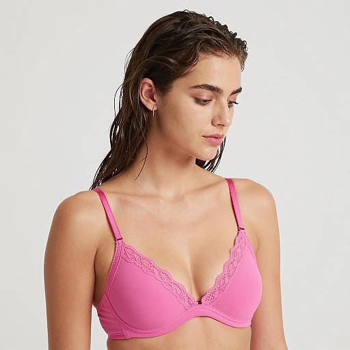 Young Woman in Pink Lace Trim Bra