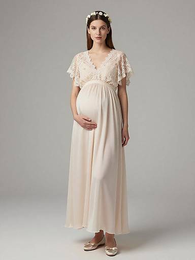 Serene Pregnant Woman in Ethereal Maternity Dress