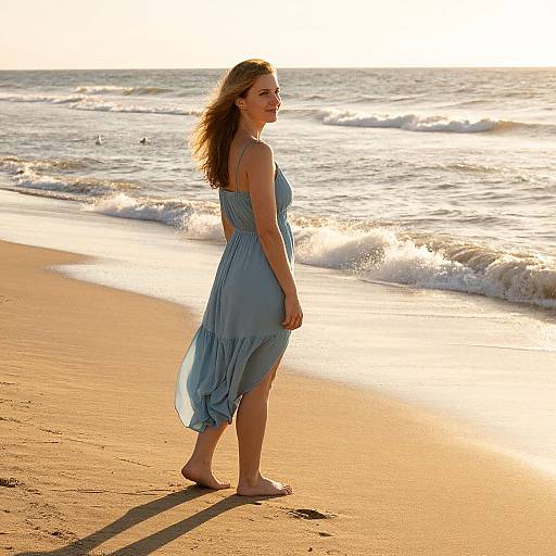 Woman in Blue Dress by Seashore