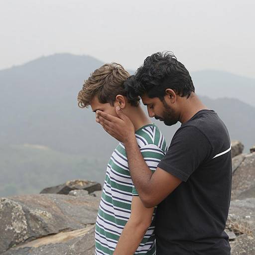 Emotional Embrace in Rocky Landscape