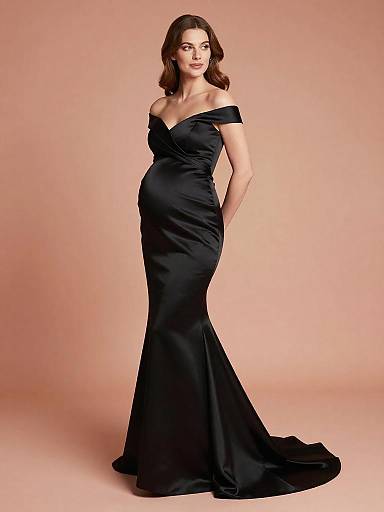 Pregnant Woman in Black Satin Maternity Gown