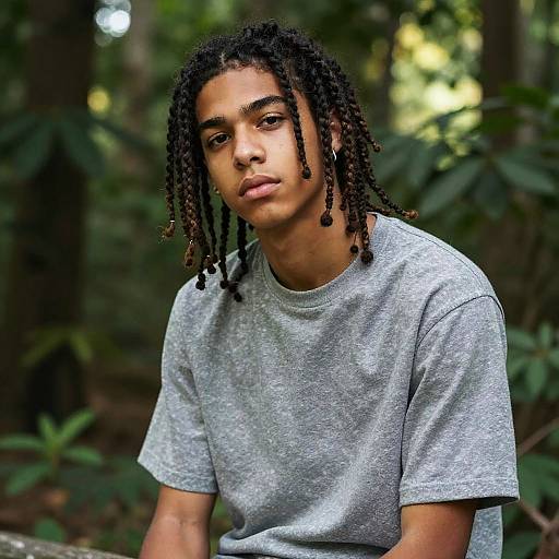 Teenage Boy with Dreads in Forest