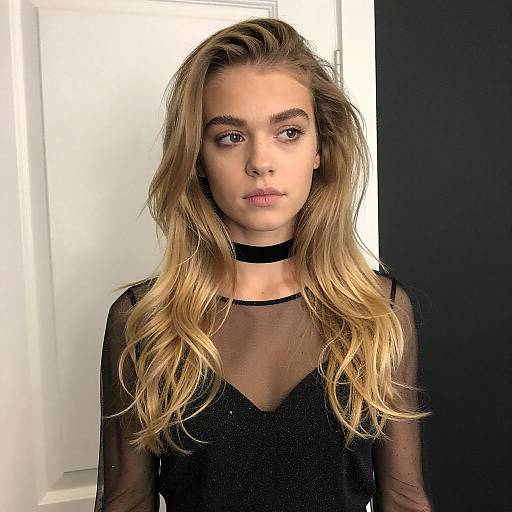 Young Woman in Black Glitter Dress