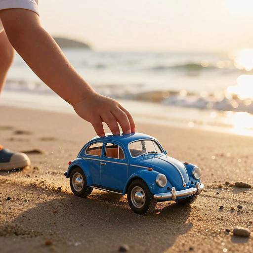 Child Playing with Blue Toy Car