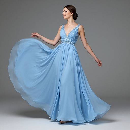 Elegant Woman in Light Blue Ball Gown