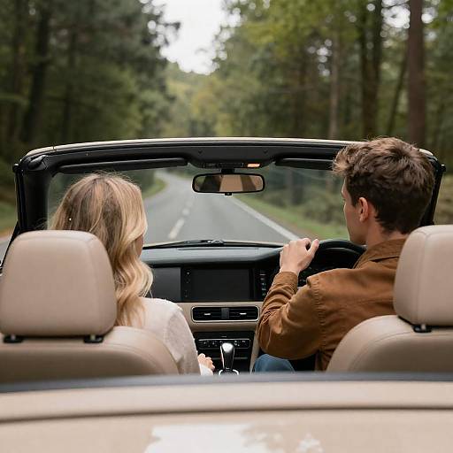Convertible Road Trip Through Forest