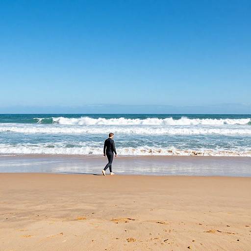 Surfer Strolling Along Polzeath Beach