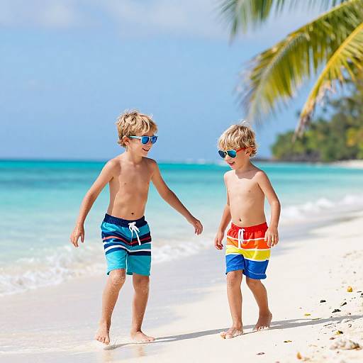 Joyful Boys Playing on Tropical Beach