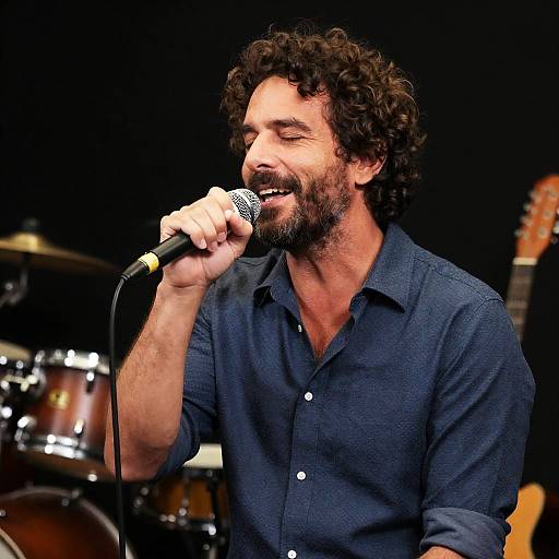 Middle-Aged Man Singing with Guitar Background